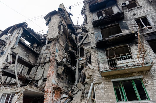 destroyed and burned houses in the city Russia Ukraine war photo