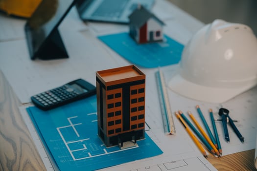 Construction and structure concept of Engineer or architect meeting for project working with partner and engineering tools on model building and blueprint in working site, contract for both companies. photo