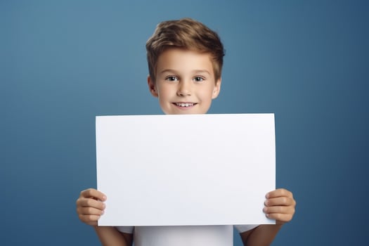 AI generated Little boy holding a blank white sheet of paper photo