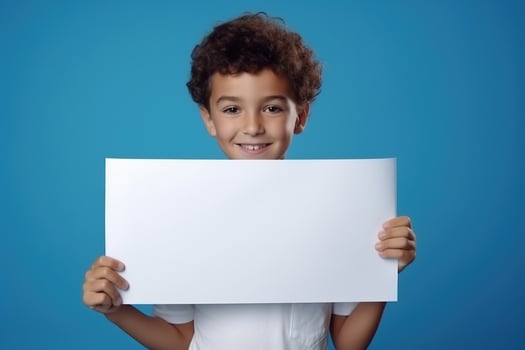 AI generated Little boy holding a blank white sheet of paper photo