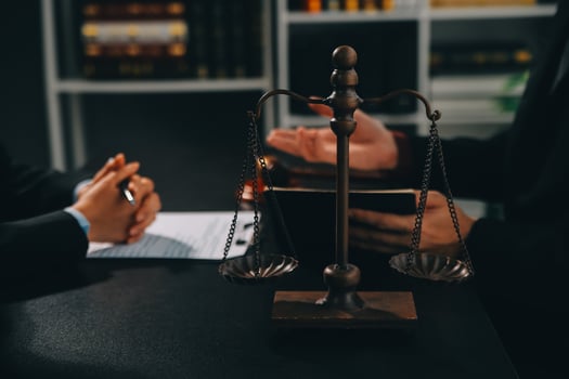 female lawyers working at the law firms. Judge gavel with scales of justice. Legal law, lawyer, advice and justice concept. photo