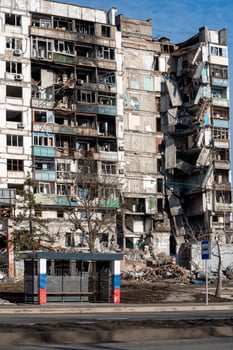 destroyed and burned houses in the city Russia Ukraine war photo