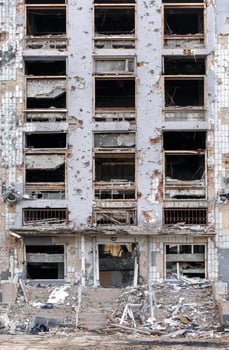 destroyed and burned houses in the city Russia Ukraine war photo