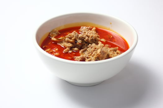 Thai food, Spicy red curry with pork on white background photo