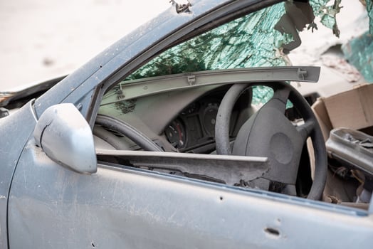 damaged and looted cars in a city in Ukraine during the war photo