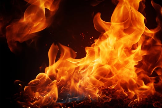 AI generated Intense fire Flames closeup on a black isolated background photo