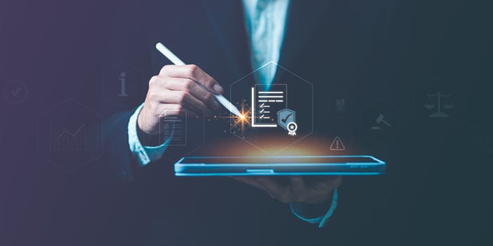 Businessman checking steps through document with a list of checkboxes ,regulation ,practices and policies ,Terms and conditions ,Examination of ethical rules ,Evaluate quality and efficiency photo
