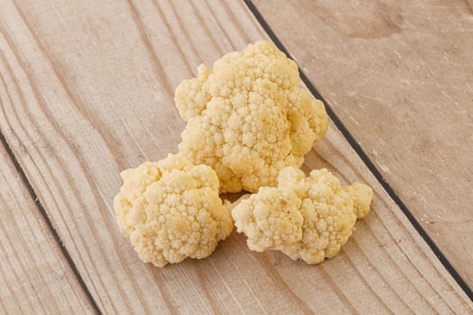 Raw white cauliflower cabbage heap photo