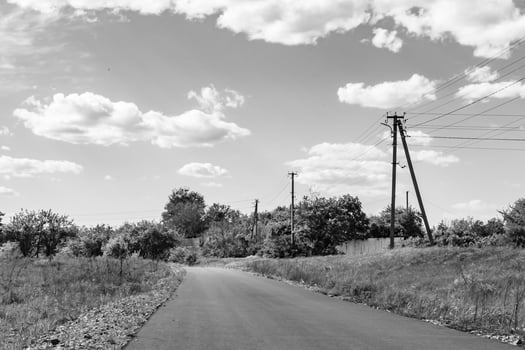 Beautiful empty asphalt road in countryside on light background photo