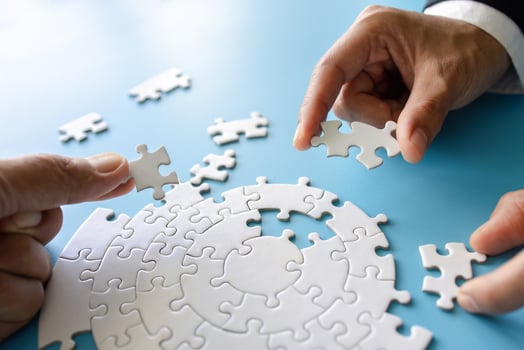 Hand put the last piece of jigsaw puzzle to complete the mission, Business solutions, success and strategy concept, The solution includes completing the mission. photo