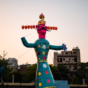 Ravnans being ignited during Dussera festival at ramleela ground in Delhi, India, Big statue of Ravana to get fire during the Fair of Dussera to celebrate the victory of truth by Lord Rama photo