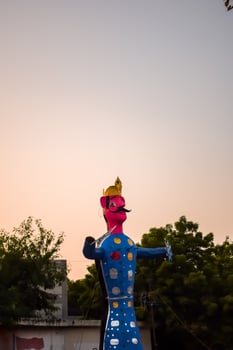 Ravnans being ignited during Dussera festival at ramleela ground in Delhi, India, Big statue of Ravana to get fire during the Fair of Dussera to celebrate the victory of truth by Lord Rama photo