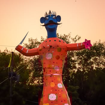 Ravnans being ignited during Dussera festival at ramleela ground in Delhi, India, Big statue of Ravana to get fire during the Fair of Dussera to celebrate the victory of truth by Lord Rama photo
