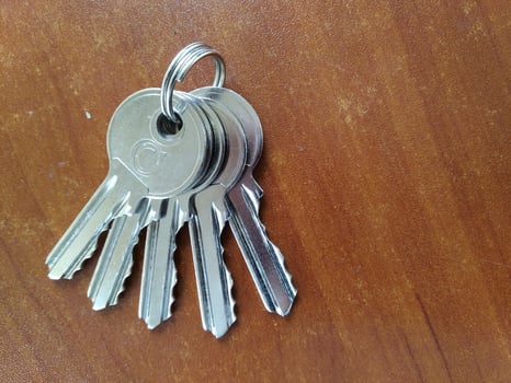 AI generated Bunch of keys on wooden background, closeup of photo