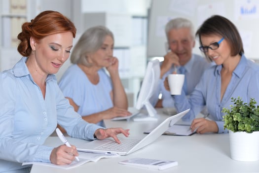 business people colleagues working together in office photo