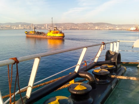 Mooring bollard on the decks of an industrial seaport. photo