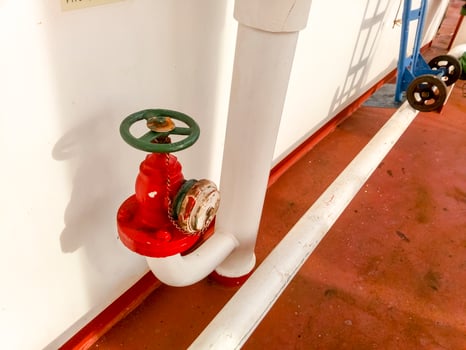 Manual shut-off valve of the outlet pipe of the water supply line of the fire-fighting system photo