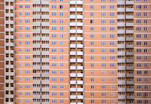 A new multi-storey house. Construction of residential apartments. Floors of the apartment house photo
