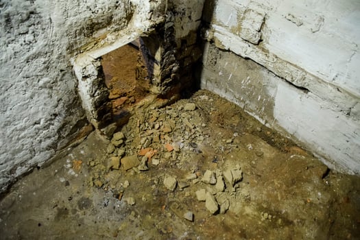 The punched wall. The opening which is beaten out in a wall. photo