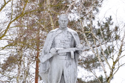 Monument to an unknown soldier in the park photo