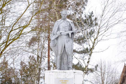 Monument to an unknown soldier in the park photo