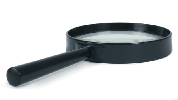 magnifying glass on white photo