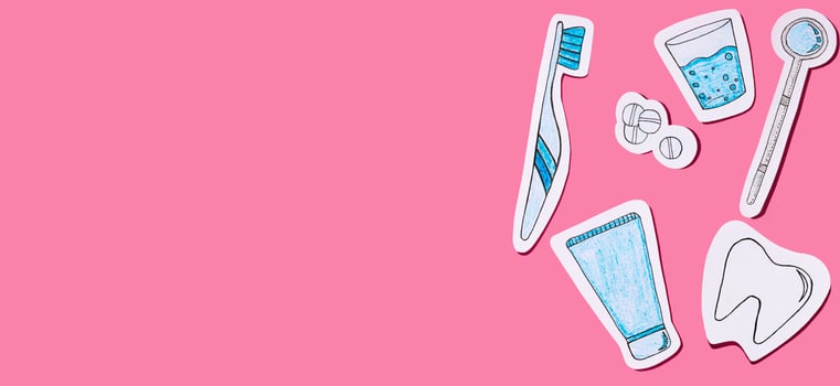 The concept of dentistry. Oral care tools cut out of paper on a pink background. Dental background. Banner. Copy space. photo