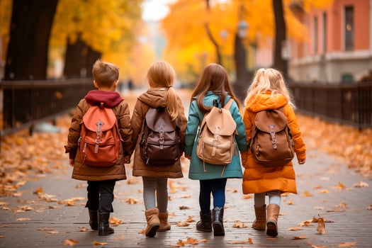 AI generated Schoolkids are walking down the street. Back view. photo