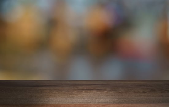 Empty wood table top and blur of out door garden background Empty wooden table space for text marketing promotion. blank wood table copy space for background photo