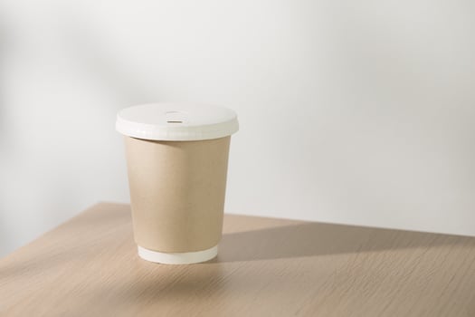 Disposable paper coffee cup photo