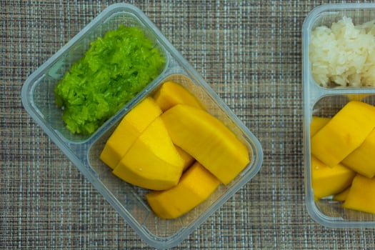 Thai famous delicious dessert. Sweet fresh ripe mango with sticky rice. photo