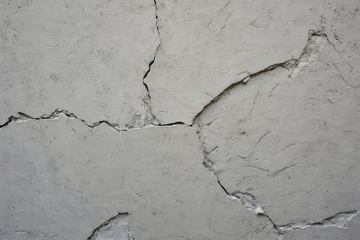 grey lime plaster with cracks background photo