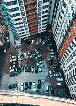 Apartment building closeup with messy car parking. Batumi.Georgia photo
