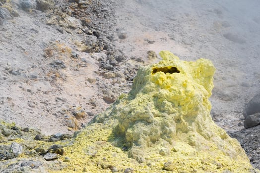 sulfur deposits around a solfatara in a fumarole field of volcano photo