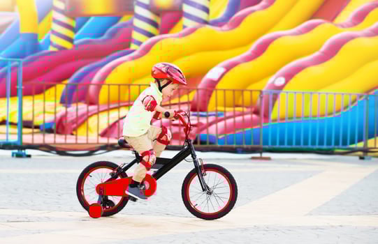Cheerful little boy on the bicycle photo