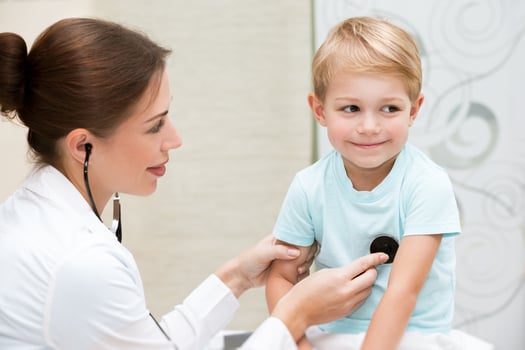 Happy boy at the doctor photo