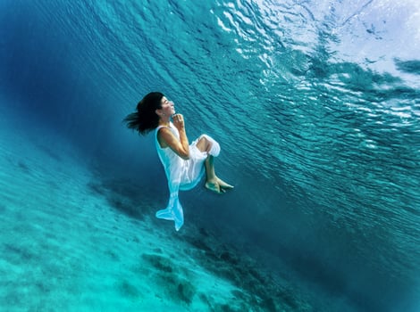 Dancing girl underwater photo