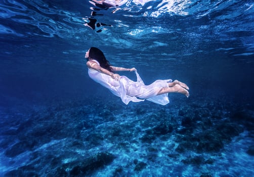Swimming in beautiful blue sea photo
