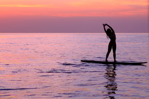 Woman doing yoga asanas photo