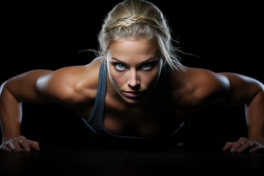 AI generated Beautiful sporty woman doing push-ups on a black background, A fitness girl doing push-ups on a black background, head section cropped, faces not revealed, AI Generated photo