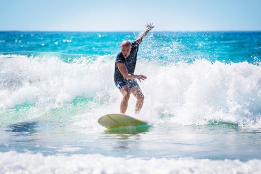 Surfer riding the wave photo