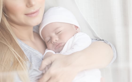 Gentle mother with baby photo