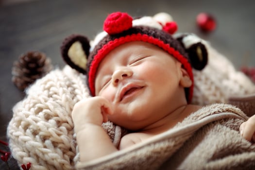 Little baby sleeping in Christmas costume photo