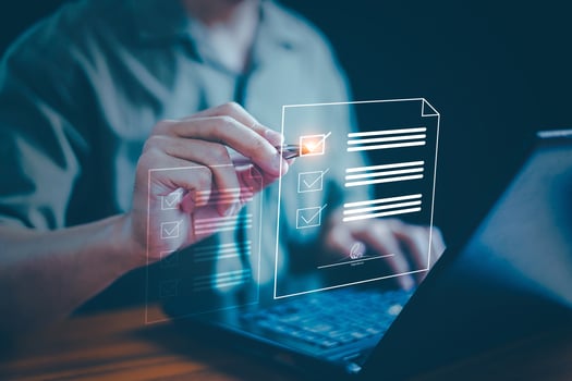 Document management or electronic signature concept, Businessman use laptop and check signature on electronic document at office, Digital network, Technology paperless sign online on application. photo