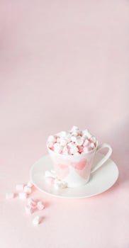 pastel peach still life with mini marshmallows in porcelain cup with pink hearts, gift for Mother's Day,Valentine's Day photo