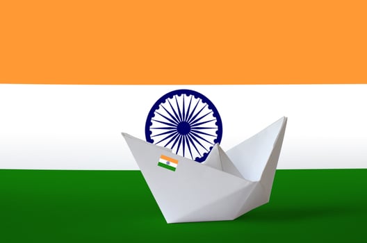 India flag depicted on paper origami ship closeup. Handmade arts concept photo