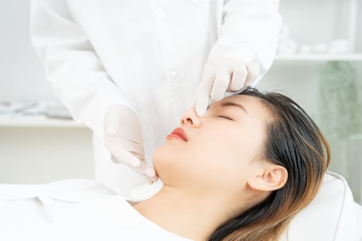 plastic surgery, beauty, Surgeon or beautician touching woman face, surgical procedure that involve altering shape of nose, doctor examines patient nose before rhinoplasty, medical assistance, health photo