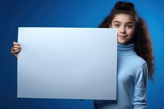 AI generated Cute little girl holding blank white sheet of paper in her hands photo