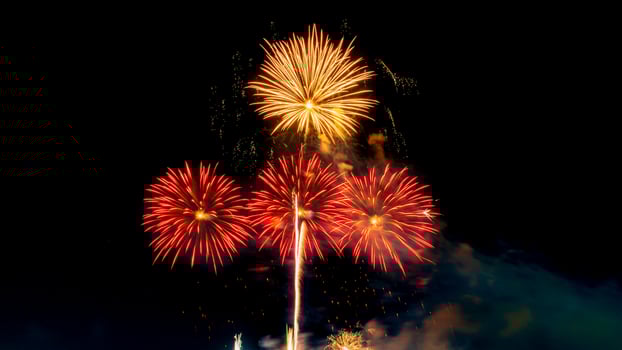 fireworks on the river in the dark sky photo