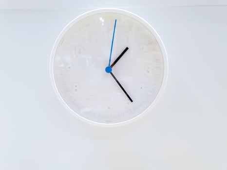 Closeup decorate modern white clock wall isolate on white background. photo